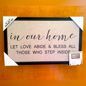 “In our home let love abide and bless all those who step inside” frame.